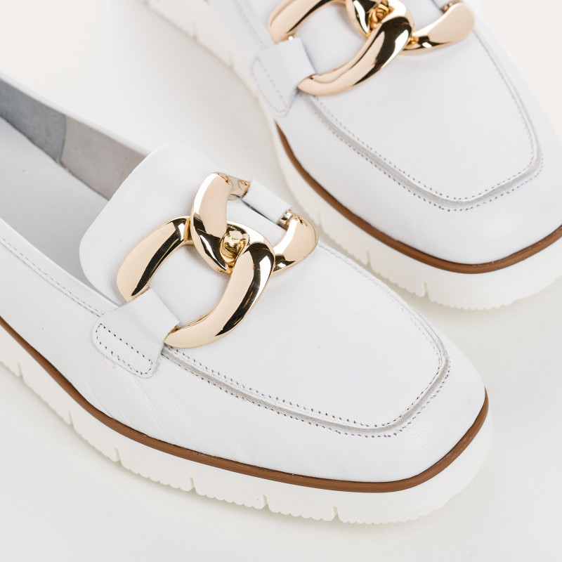 Leather compensated loafers with golden or silver accessories