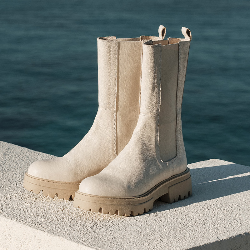 Grained leather boots with elastic thick soap