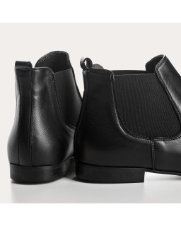 Boots Chelsea plates en cuir embossé lézard avec élastiques