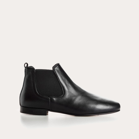 Boots Chelsea plates en cuir embossé lézard avec élastiques