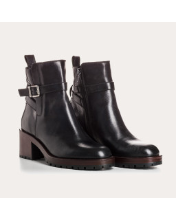 Black and red leather boots with golden buckle and inside zip