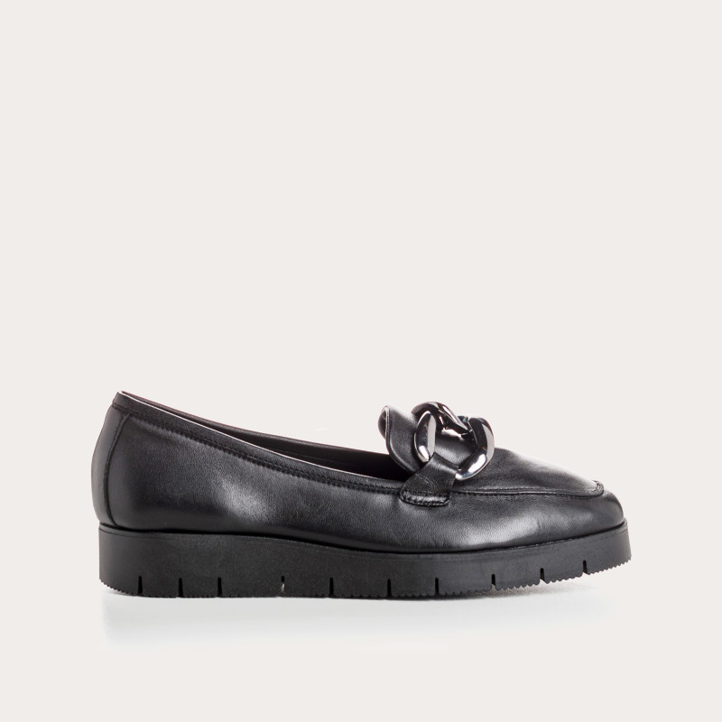 Leather compensated loafers with golden or silver accessories