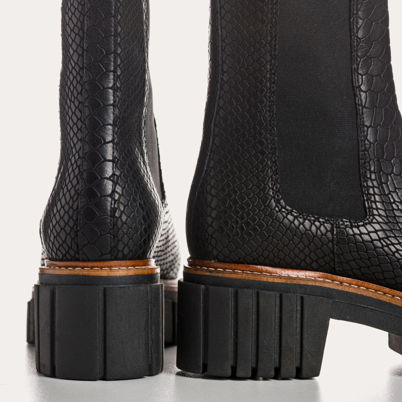 Boots Chelsea noires en cuir embossé python avec élastiques