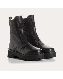 Boots Chelsea plates noires en cuir grainé avec élastiques