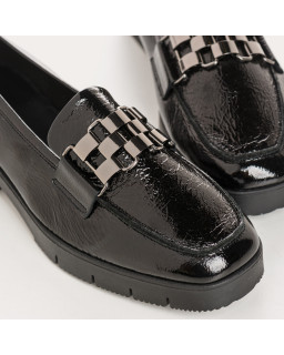Varnish leather loafers with metal accessories