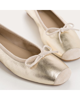 Flat ballerinas with metallic leather knot