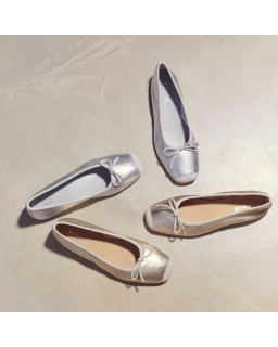 Ballerines plates à nœud en cuir métallisé