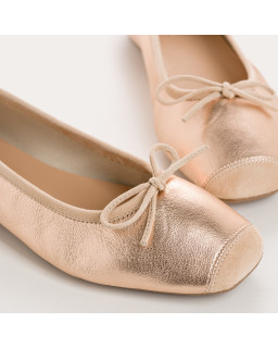 Flat ballerinas with metallic leather knot