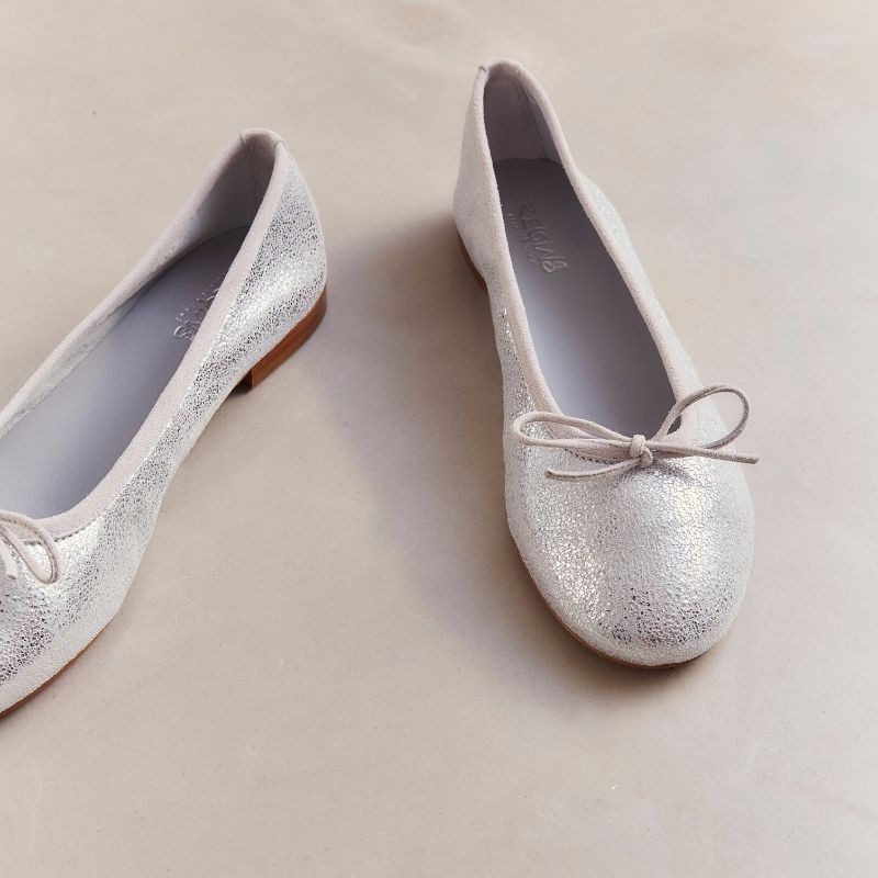 Flat ballerinas with metallic leather knot with rounded butt