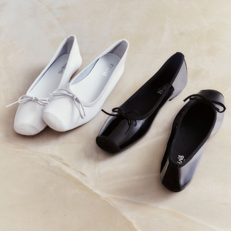 Planted leather bow ballerinas with velvet leather reinforcement