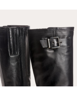 Bottes noires en cuir lisse avec boucles argentées réglables