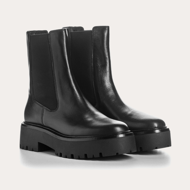 Boots Chelsea noires en cuir avec élastiques