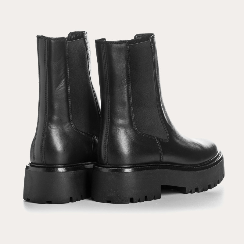 Boots Chelsea noires en cuir avec élastiques