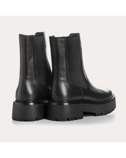 Boots Chelsea noires en cuir avec élastiques