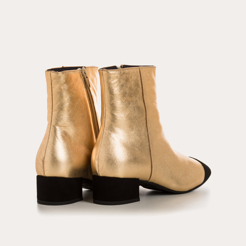 Silver and black metallic leather boots