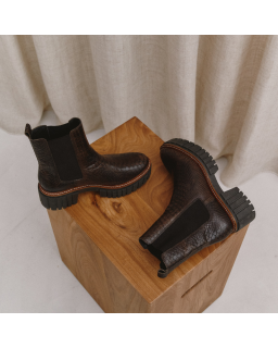 Boots Chelsea noires en cuir embossé python avec élastiques